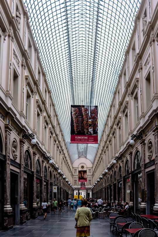 red and white cross on building in Royal Galleries of Saint-Hubert Belgium