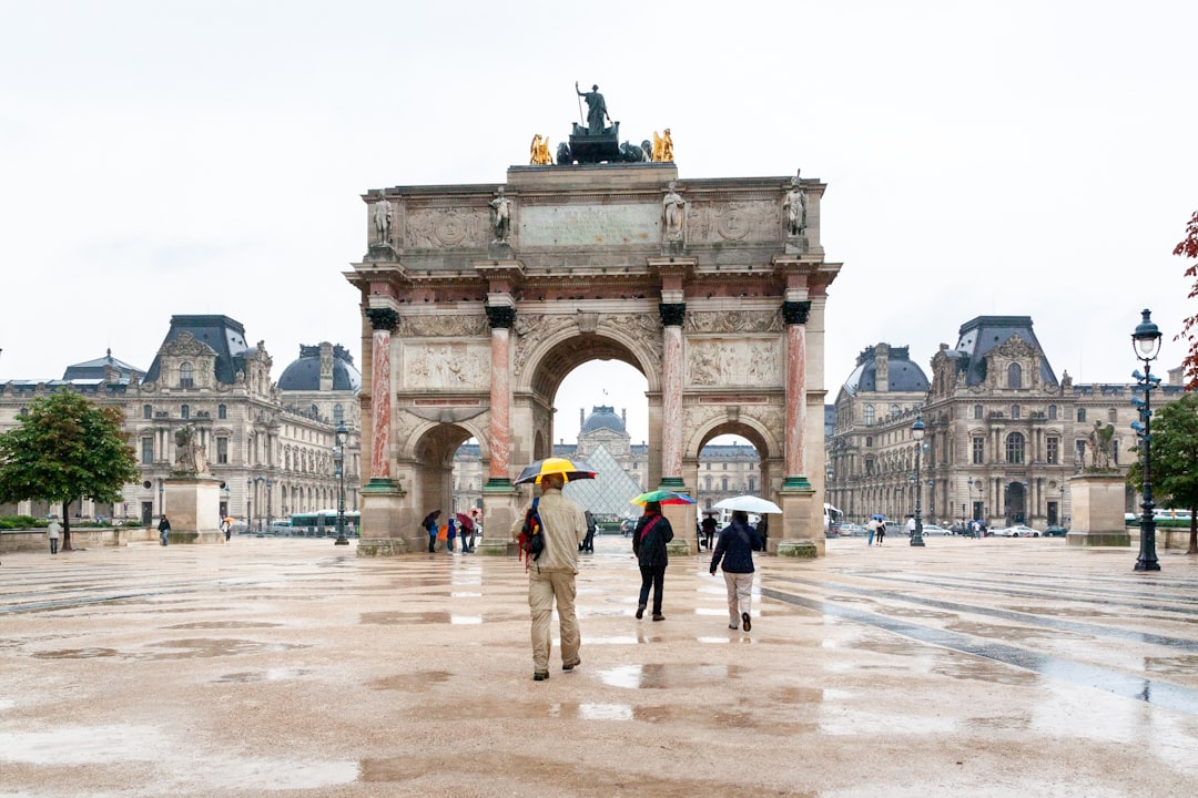 people walking on brown concrete pathway during daytime