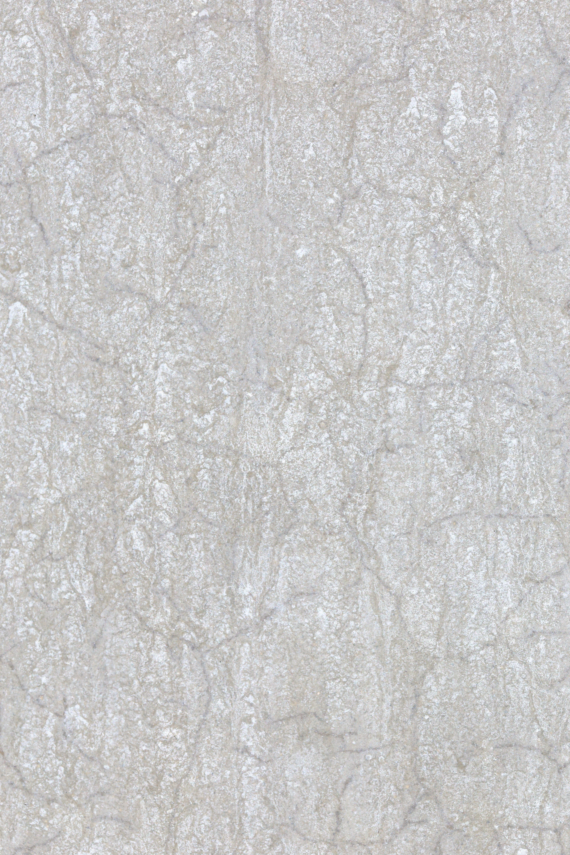 a close up of a white marble wallpaper