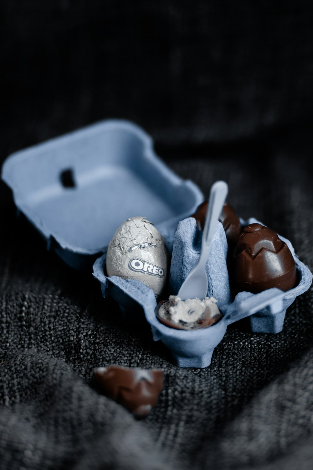 chocolate coated cookies on blue plastic container