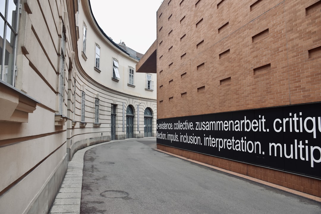 brown brick building with UNK UNK UNK, Core values of the Kunsthalle Wien under the Nicolaus Schafhausen directorium in 
