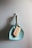 brown wooden brush on white wall