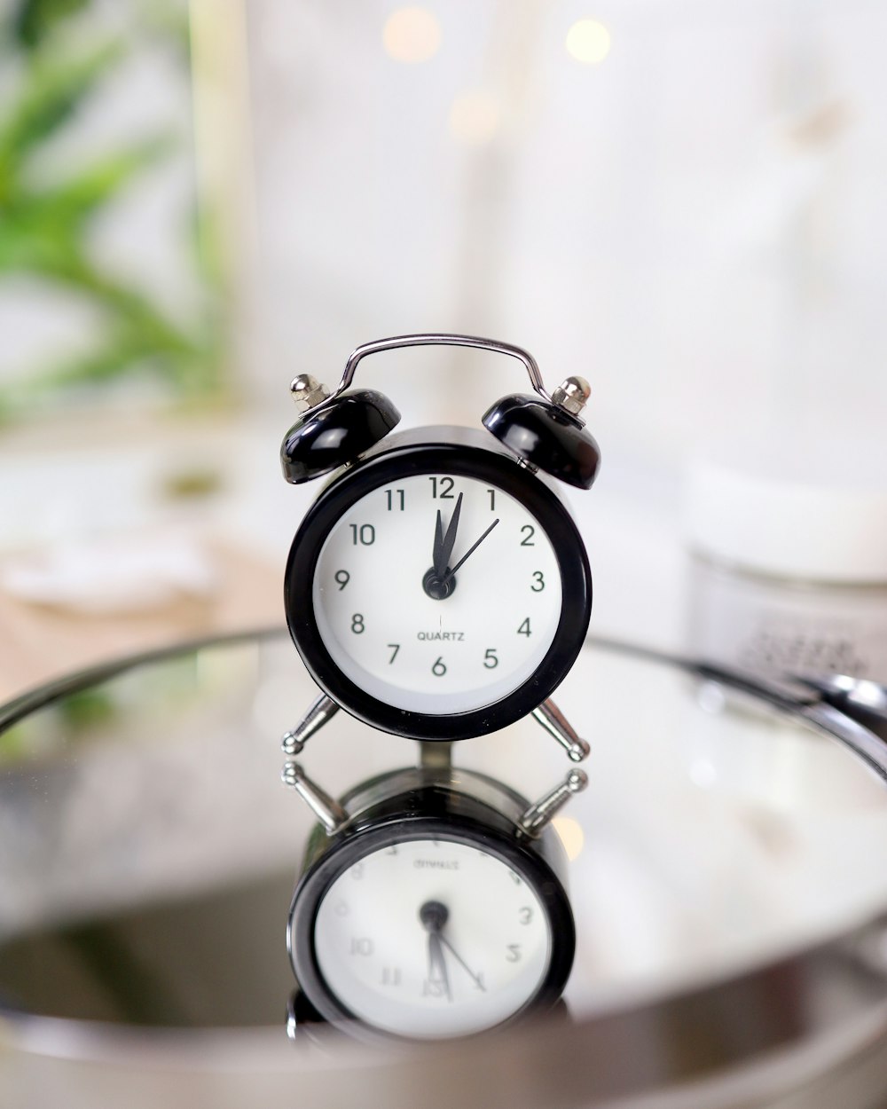 silver and white alarm clock