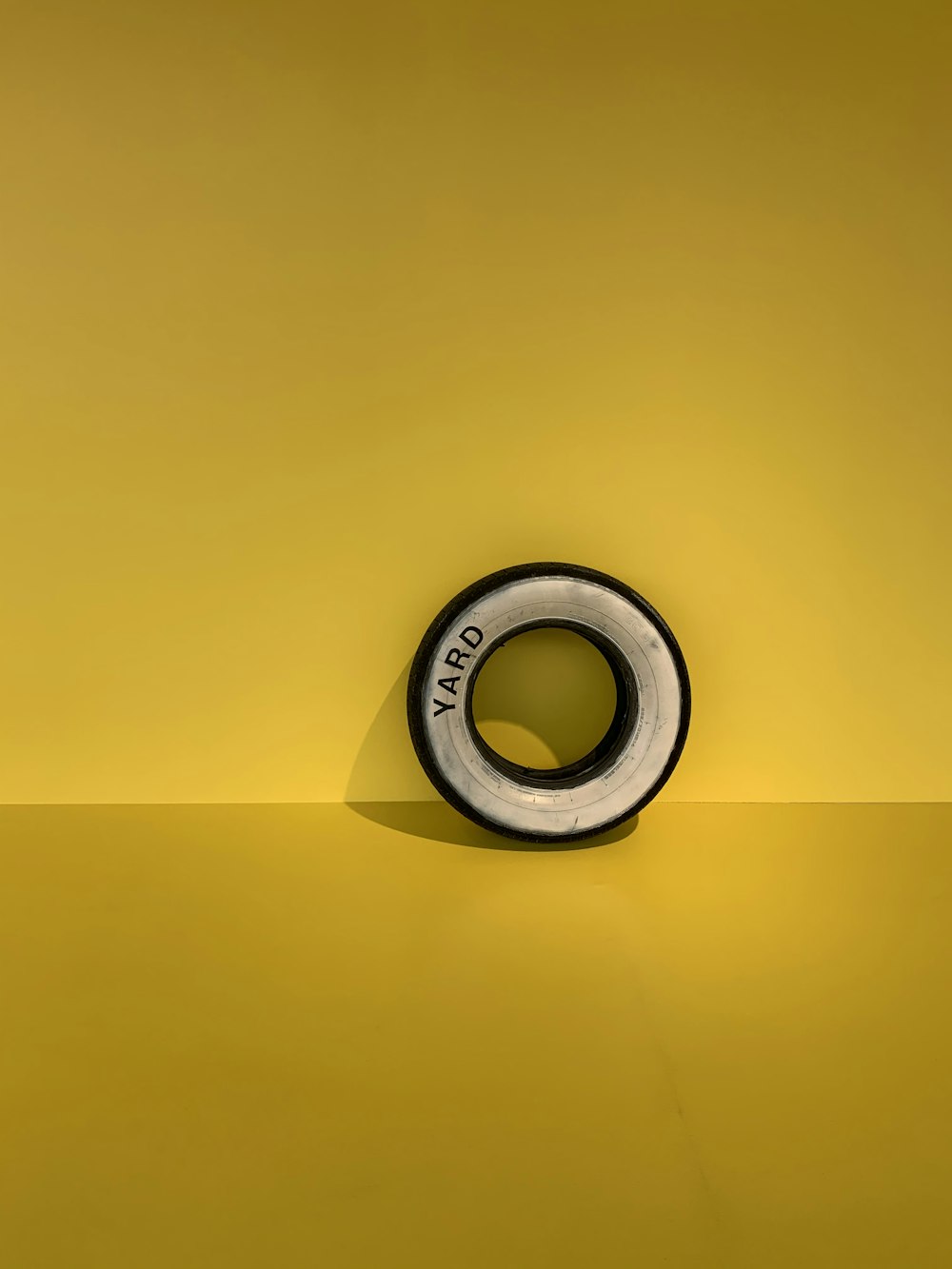 black and yellow round frame