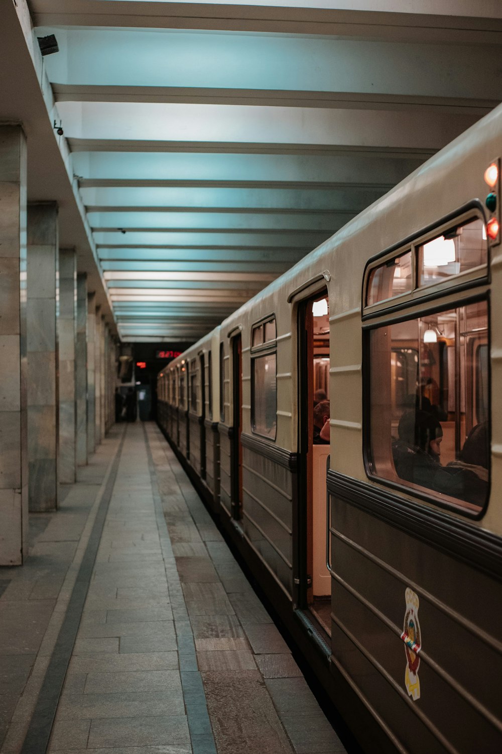 red and black train in train station