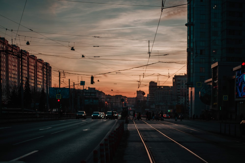 cars on road near buildings during daytime