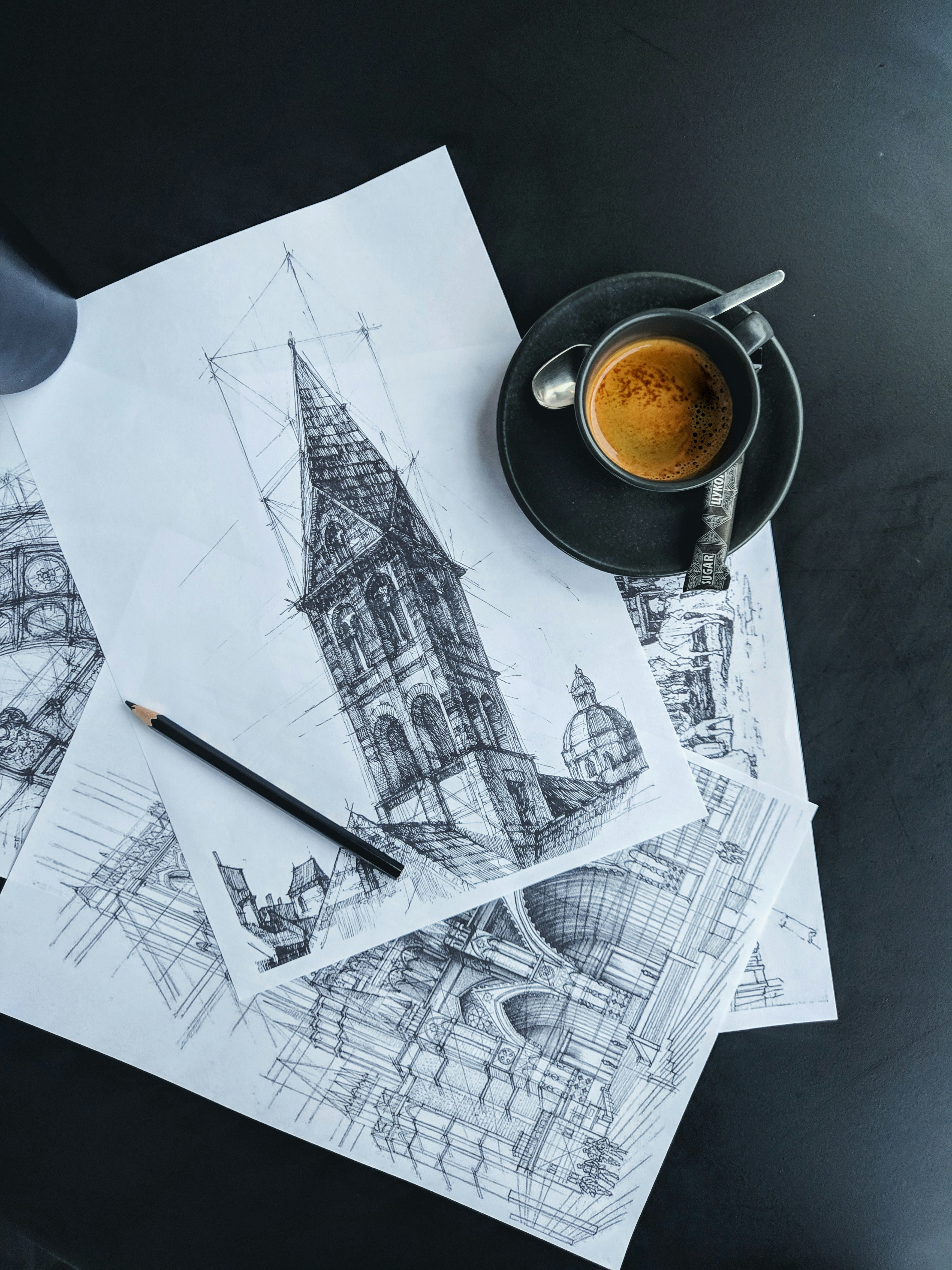 black ceramic mug on white printer paper