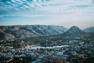 aerial view of city near mountain during daytime