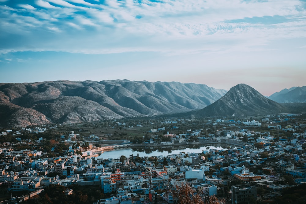 aerial view of city near mountain during daytime