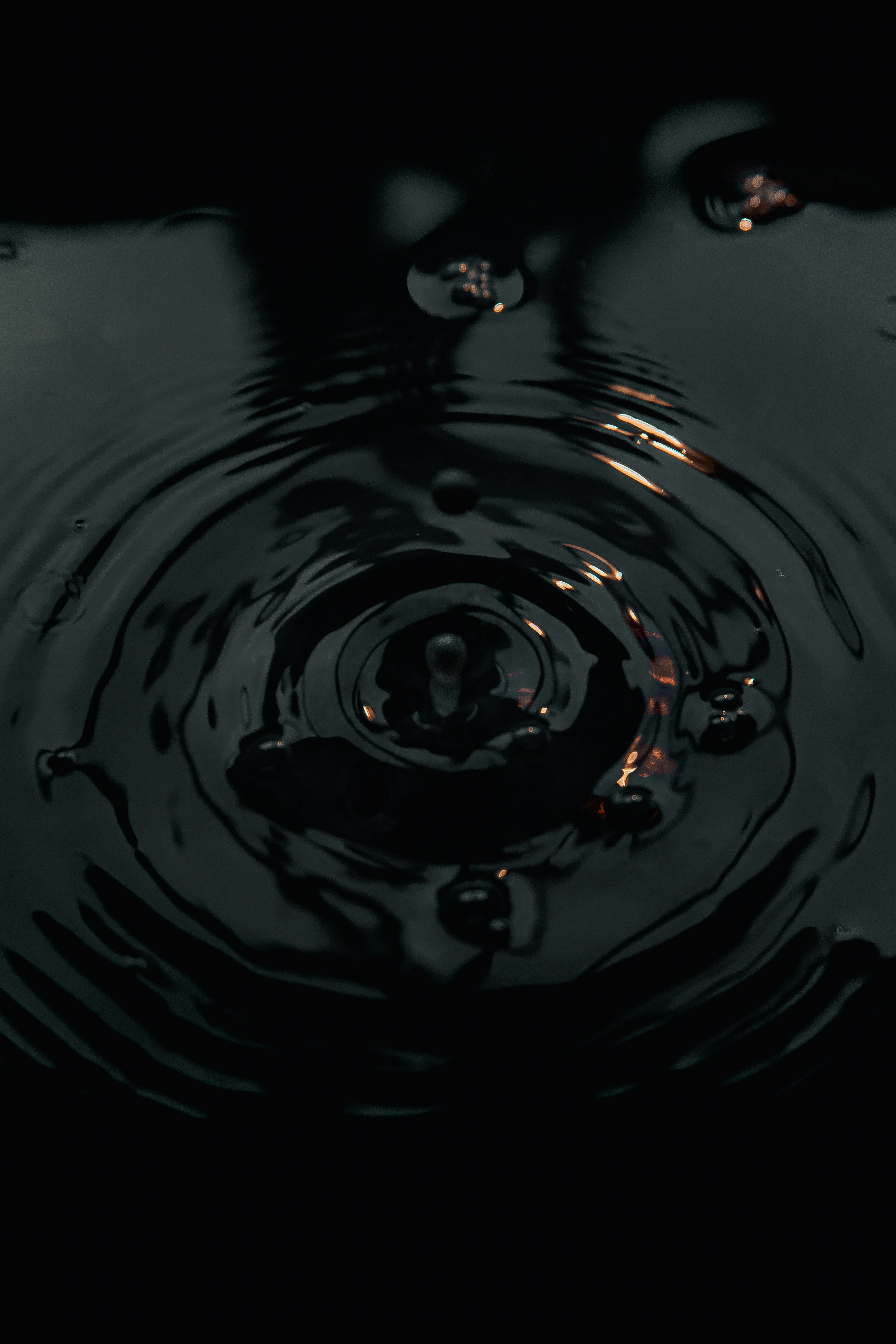 water drop on body of water