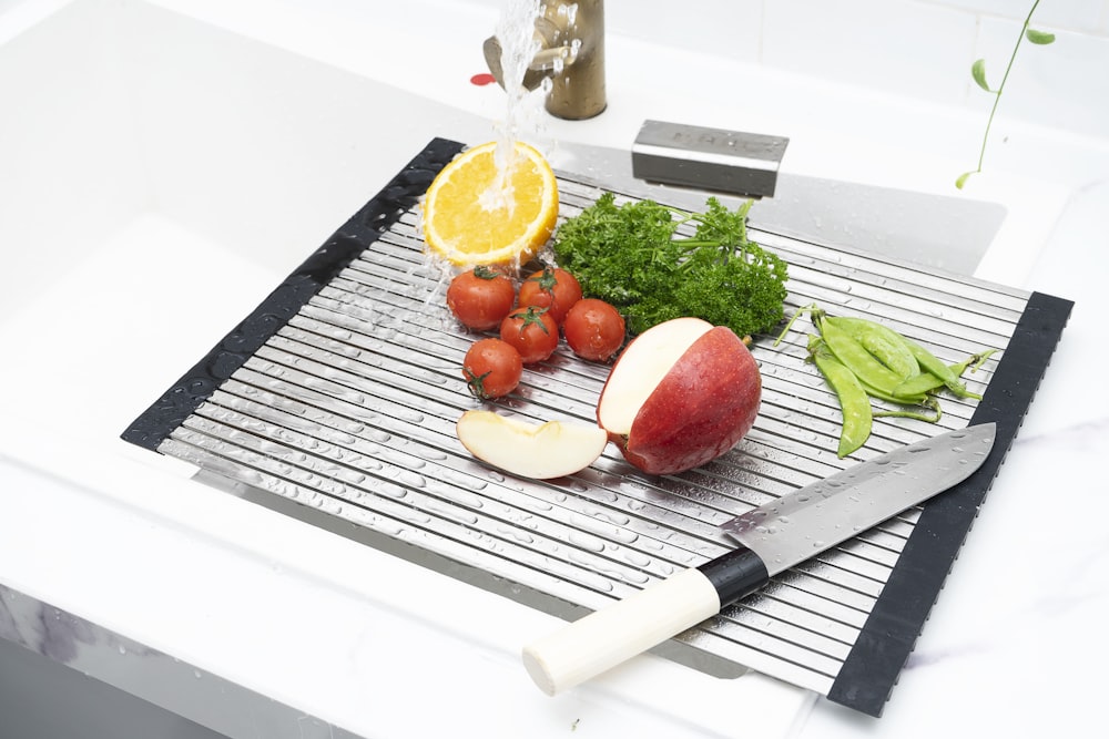 sliced tomato on chopping board