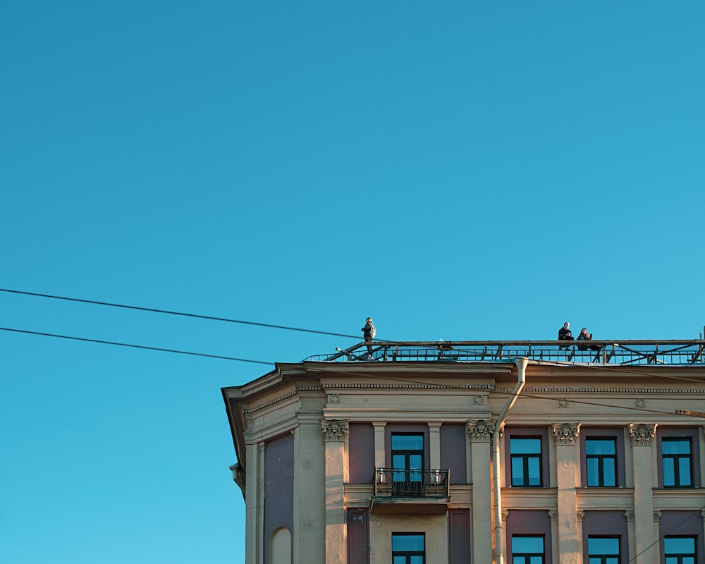 white and brown concrete building under blue sky during daytime