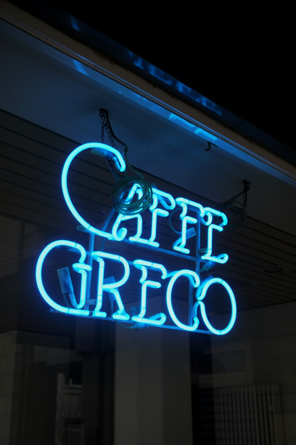white and blue UNKs coffee shop led signage