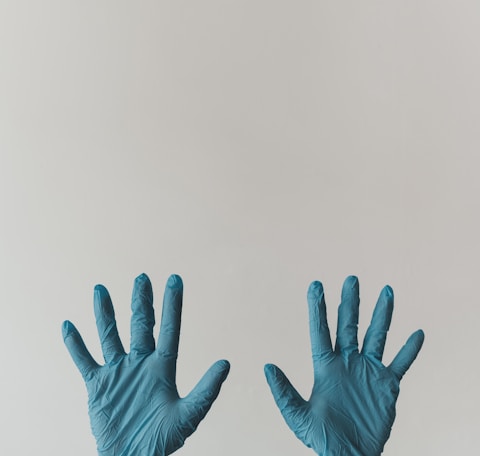 persons left hand with white background