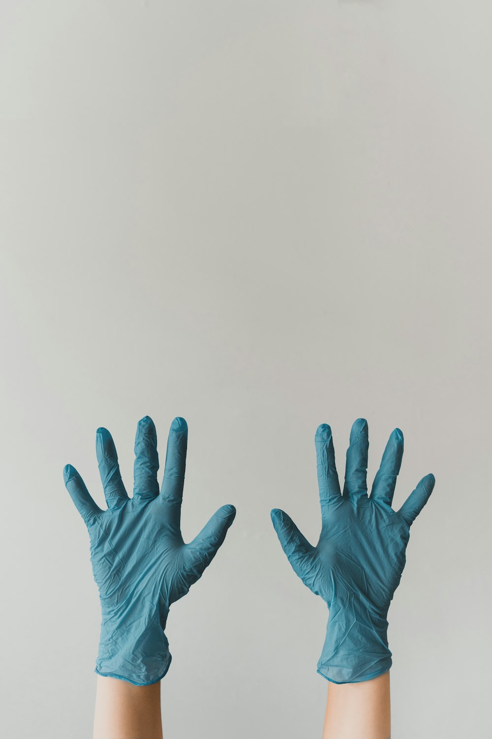 persons left hand with white background