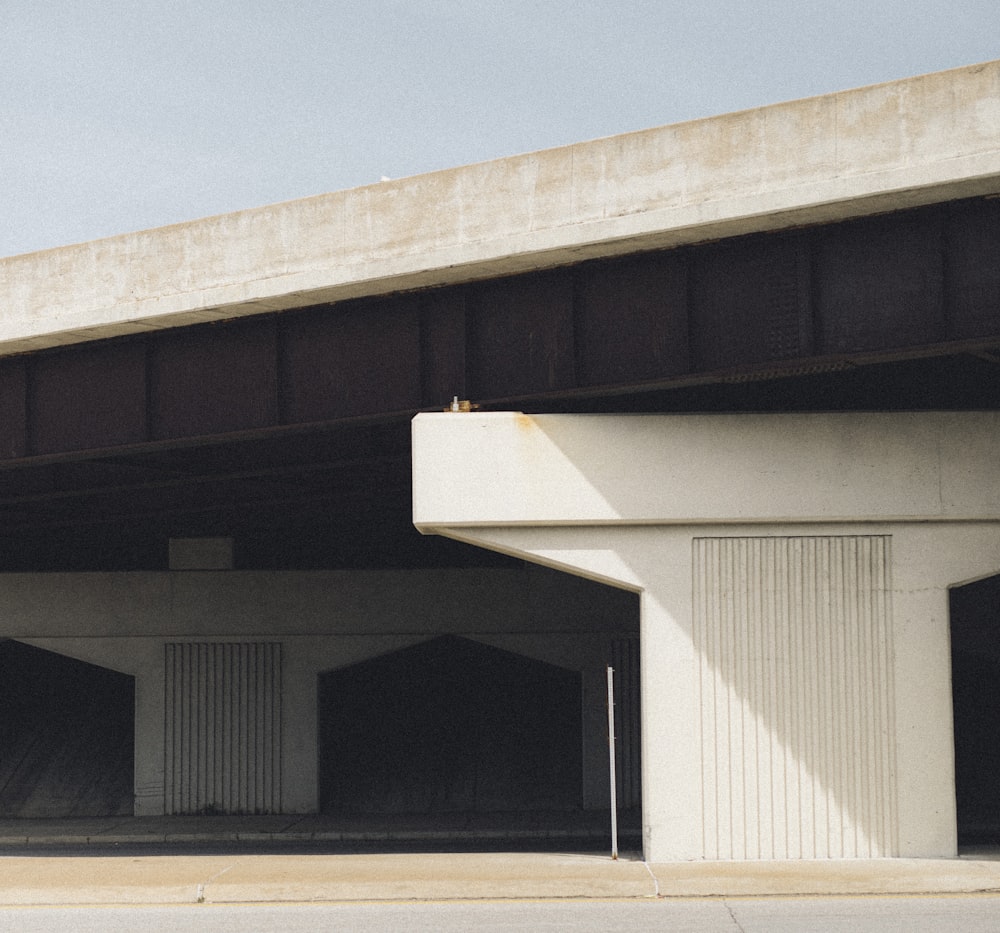 white and black concrete building under blue sky during daytime