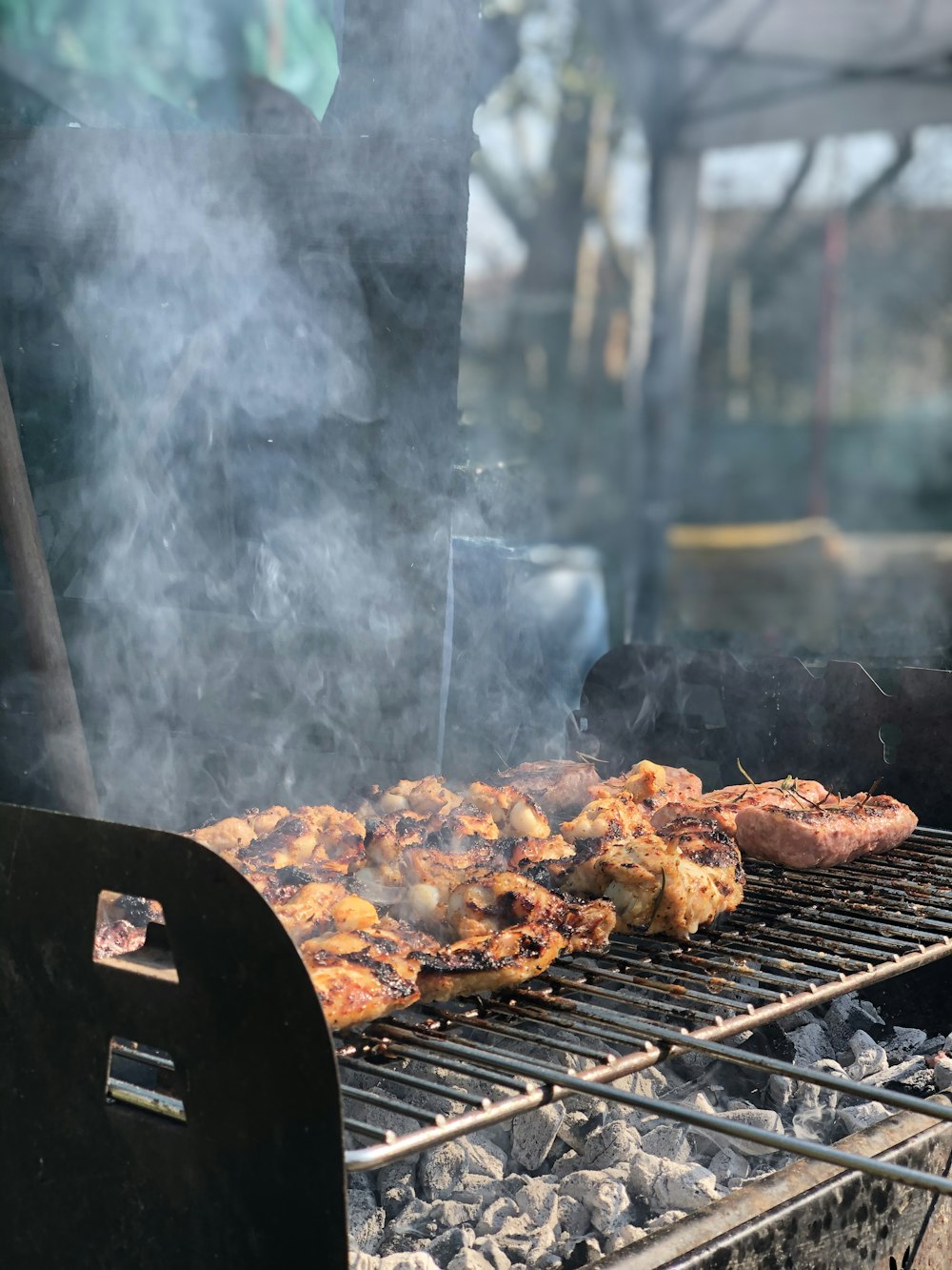 grilled meat on charcoal grill