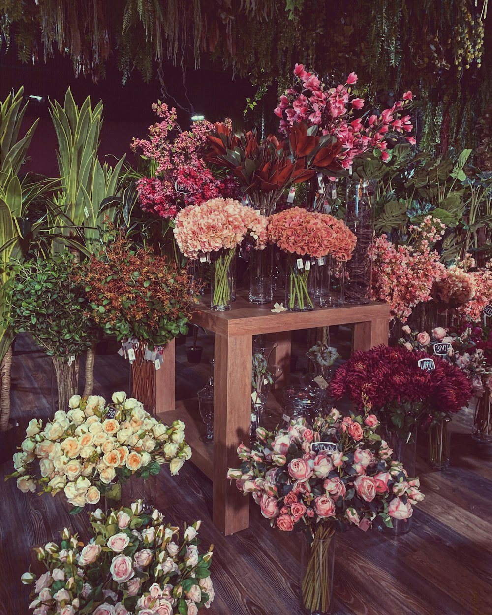 a bunch of flowers that are on a table