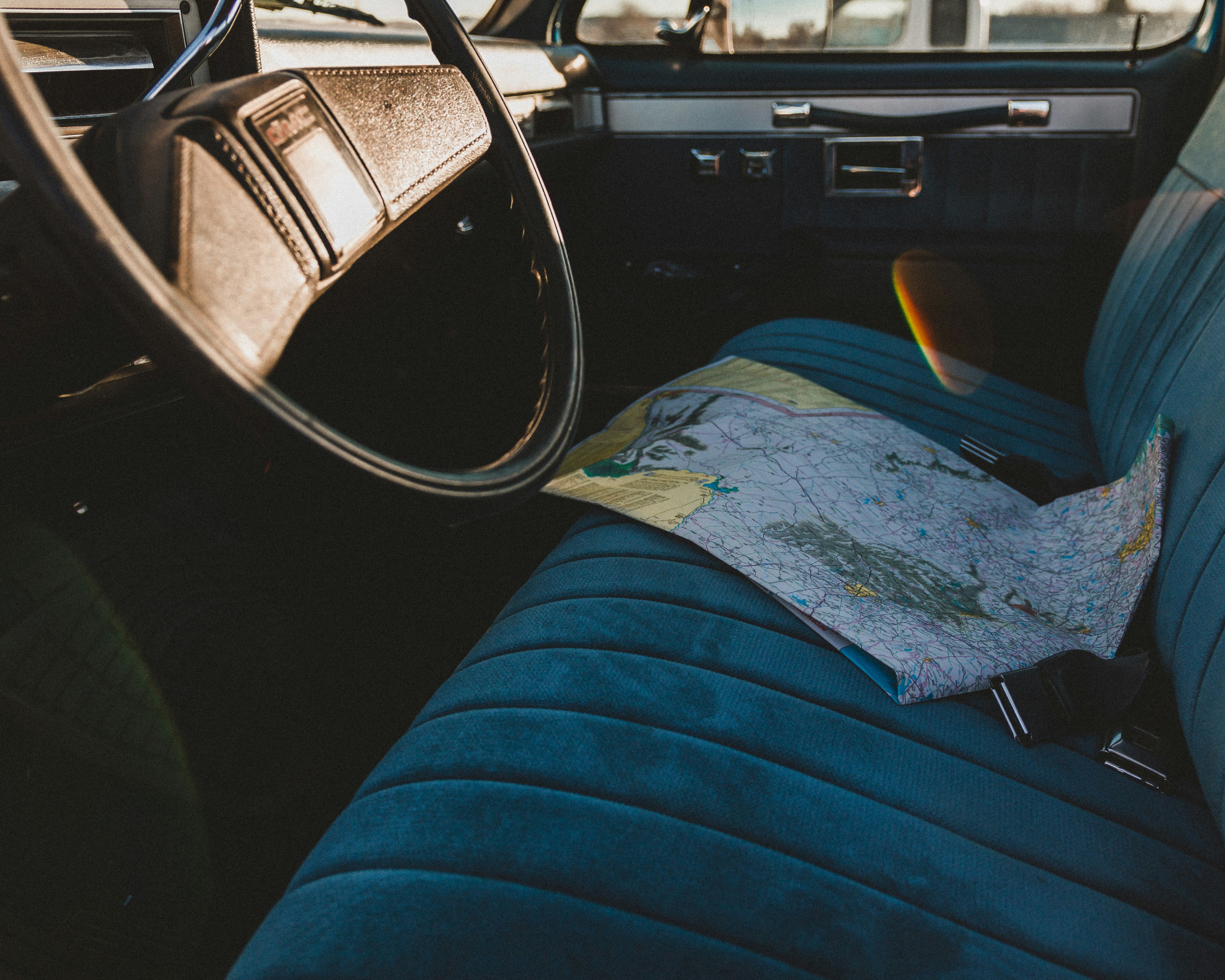 black leather belt on blue textile, 