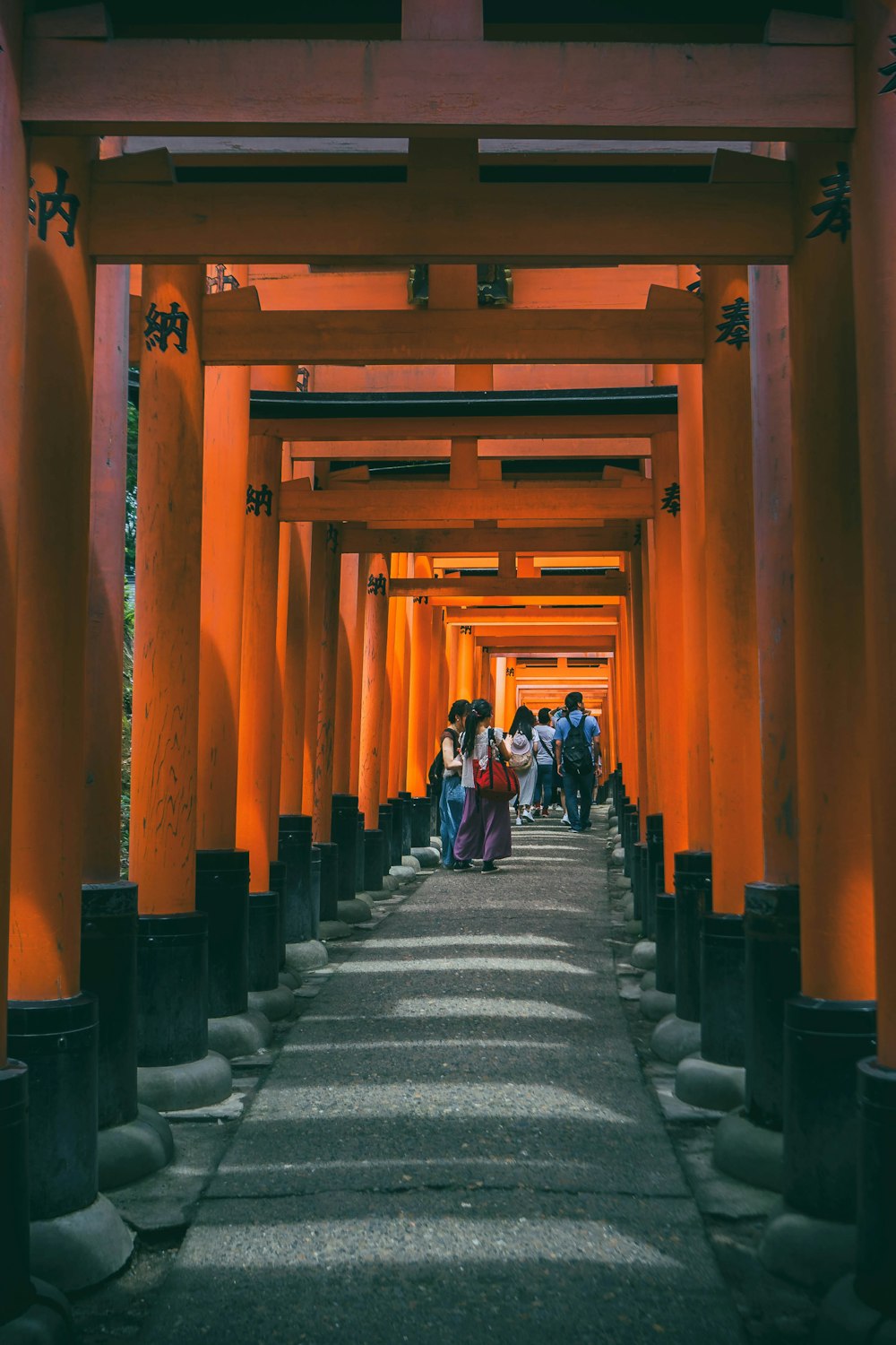 people sitting on gray stairs