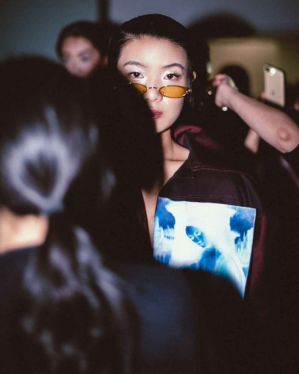 woman in black shirt wearing sunglasses