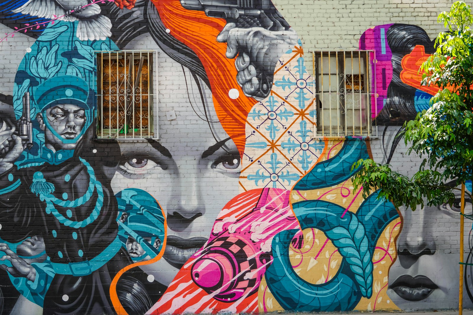 Sony a7R IV + Sony FE 24-240mm F3.5-6.3 OSS sample photo. Blue and pink graffiti photography