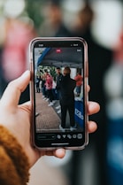 person holding black samsung android smartphone
