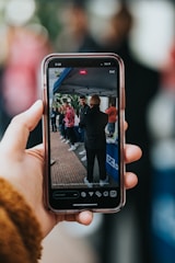 person holding black samsung android smartphone