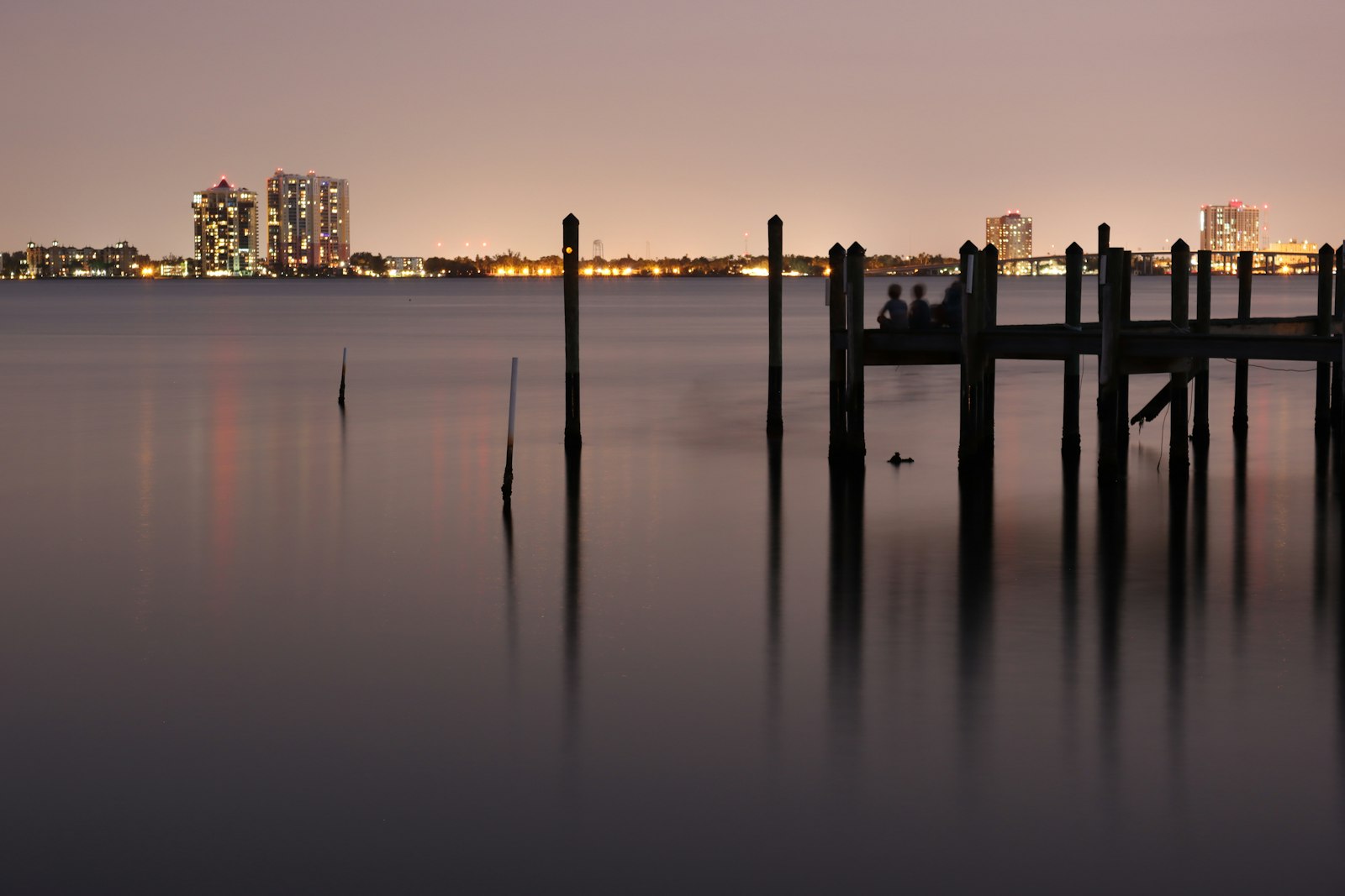 Fort Myers riverfront skyline along the Caloosahatchee River at dusk