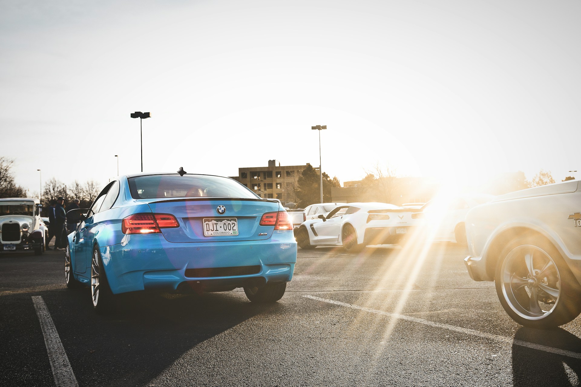 woman wearing yellow long-sleeved dress under white clouds and blue sky during daytime