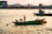 Smiling group of school children enjoying a scenic Kerala backwater boat ride during their tour
