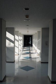 blue white and brown tiled hallway
