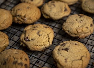 brown cookies on black metal grill