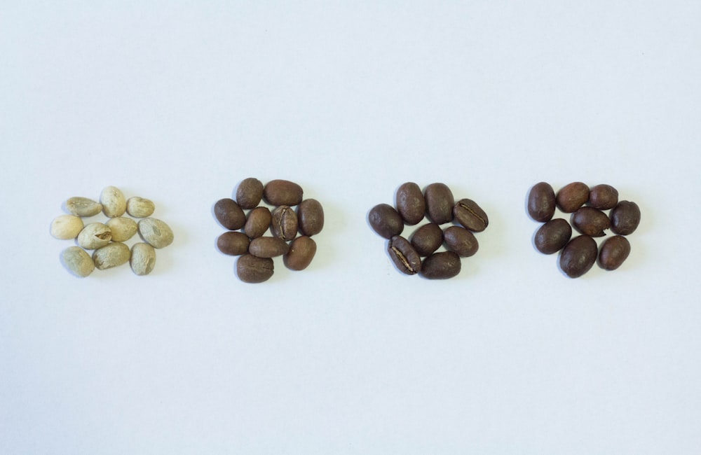 brown and beige stones on white surface