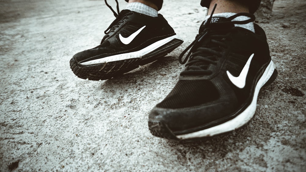 black and white nike athletic shoes