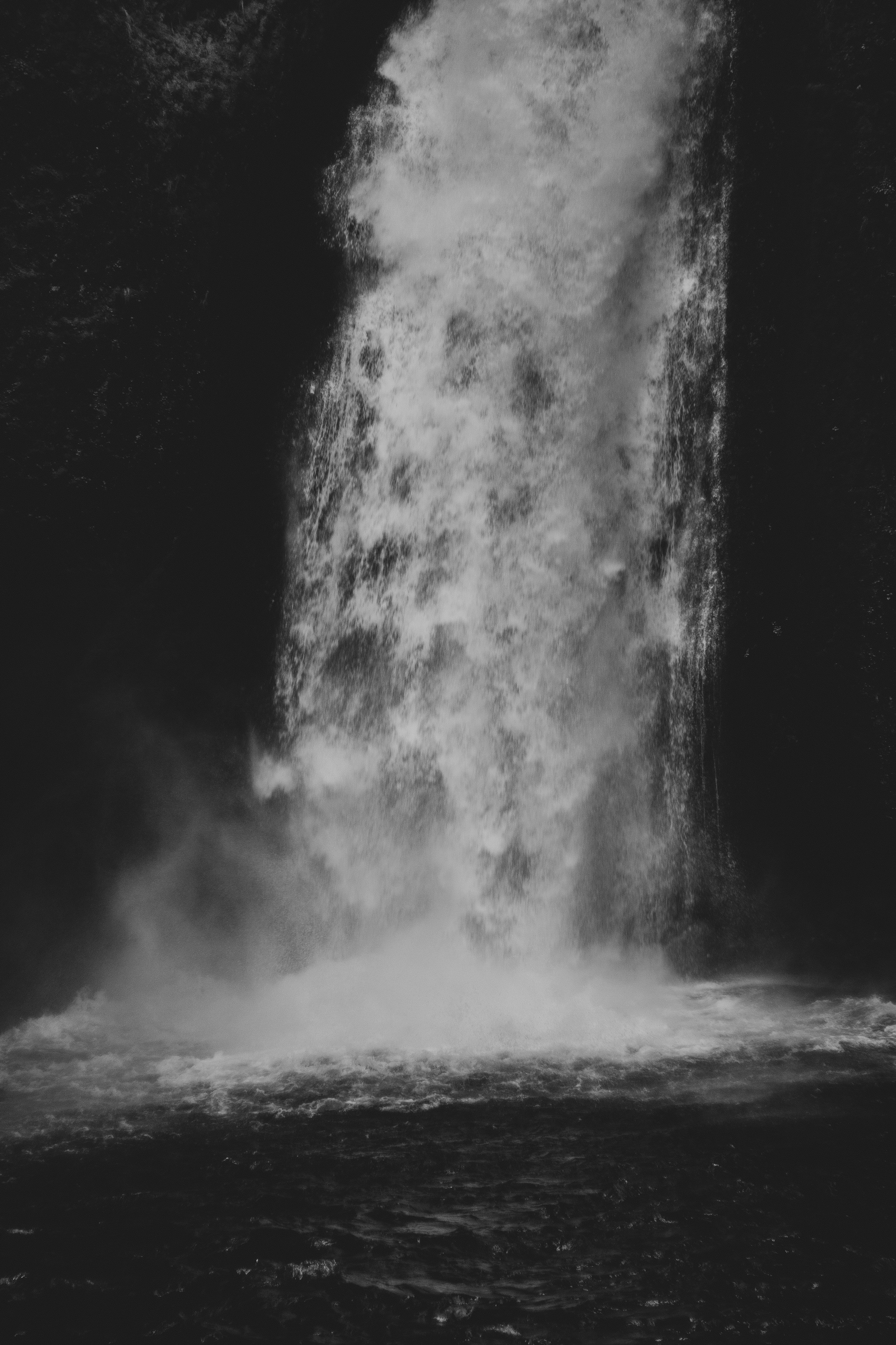 water falls in grayscale photography