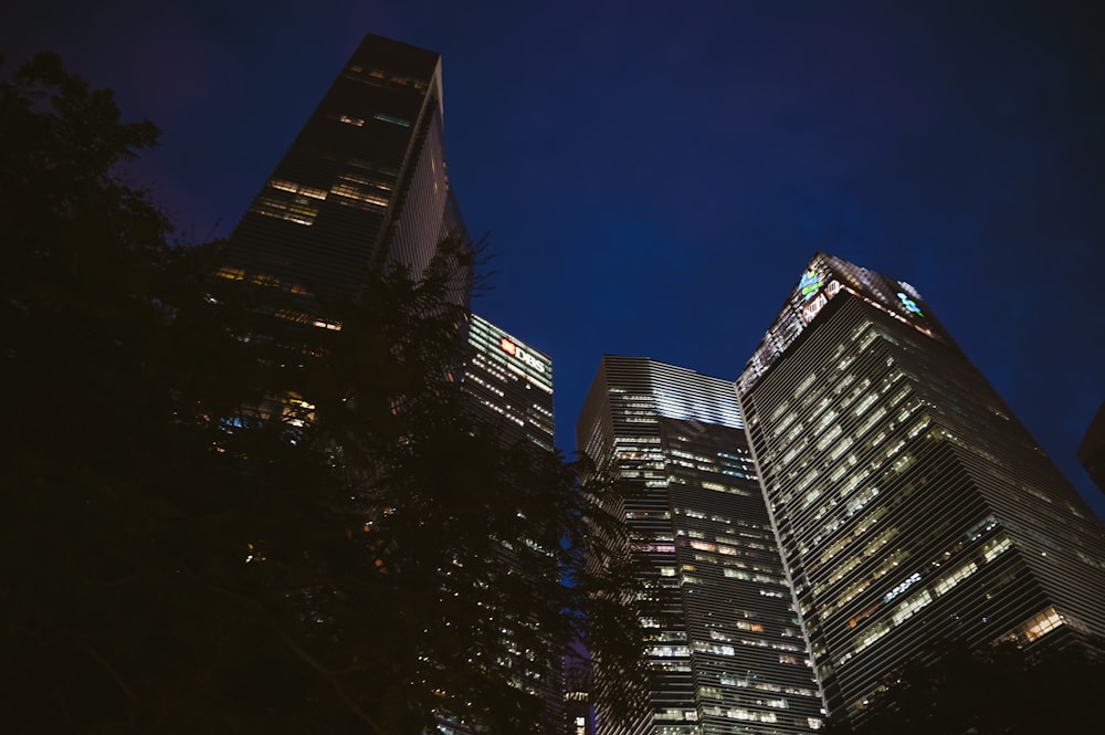 low angle photography of high rise buildings