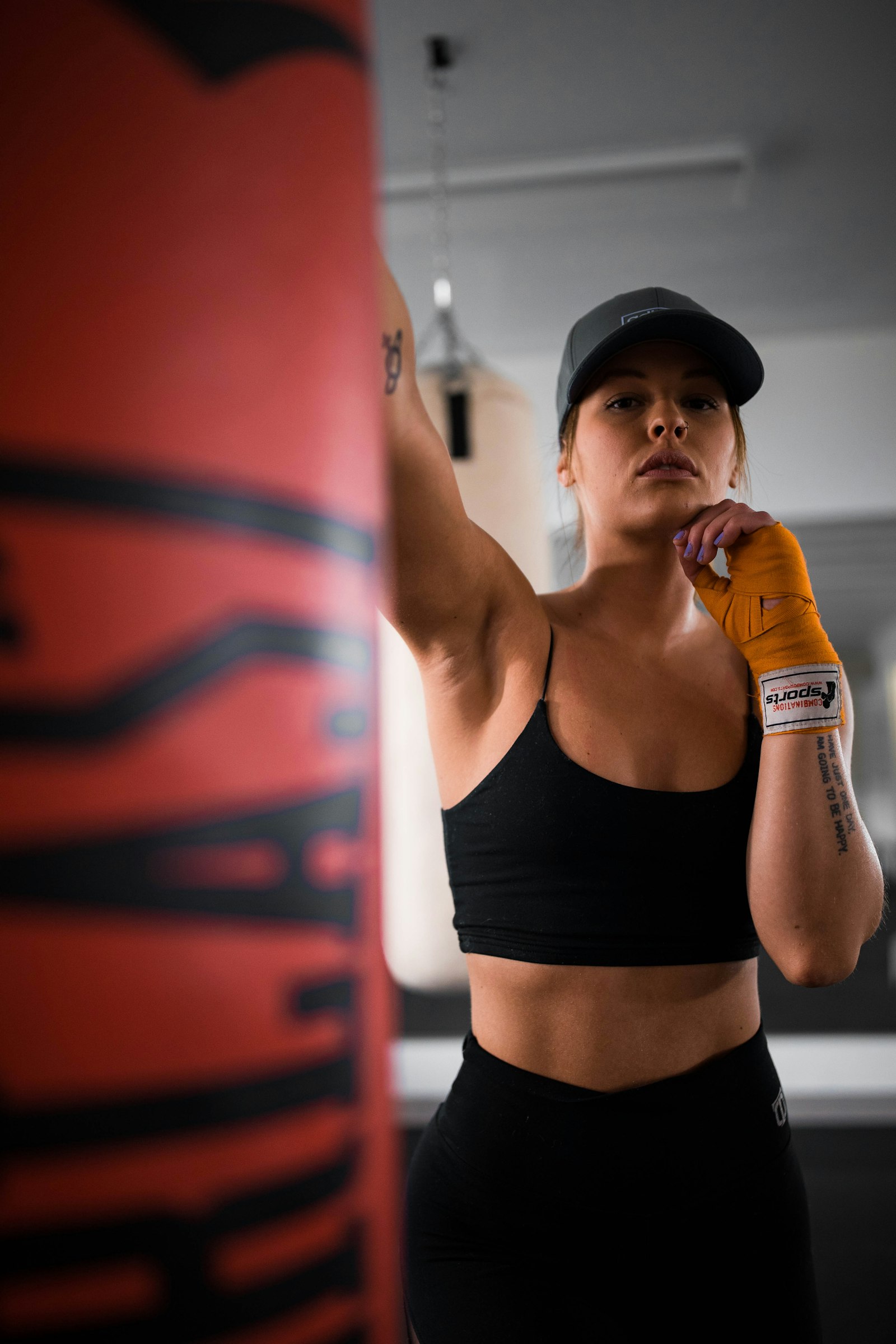 Canon EOS-1D X Mark II + Canon EF 35mm F1.4L II USM sample photo. Woman in black sports photography