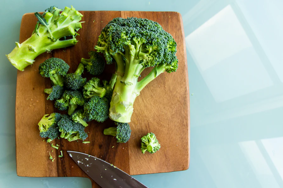 Fresh broccoli on a wooden chopping board