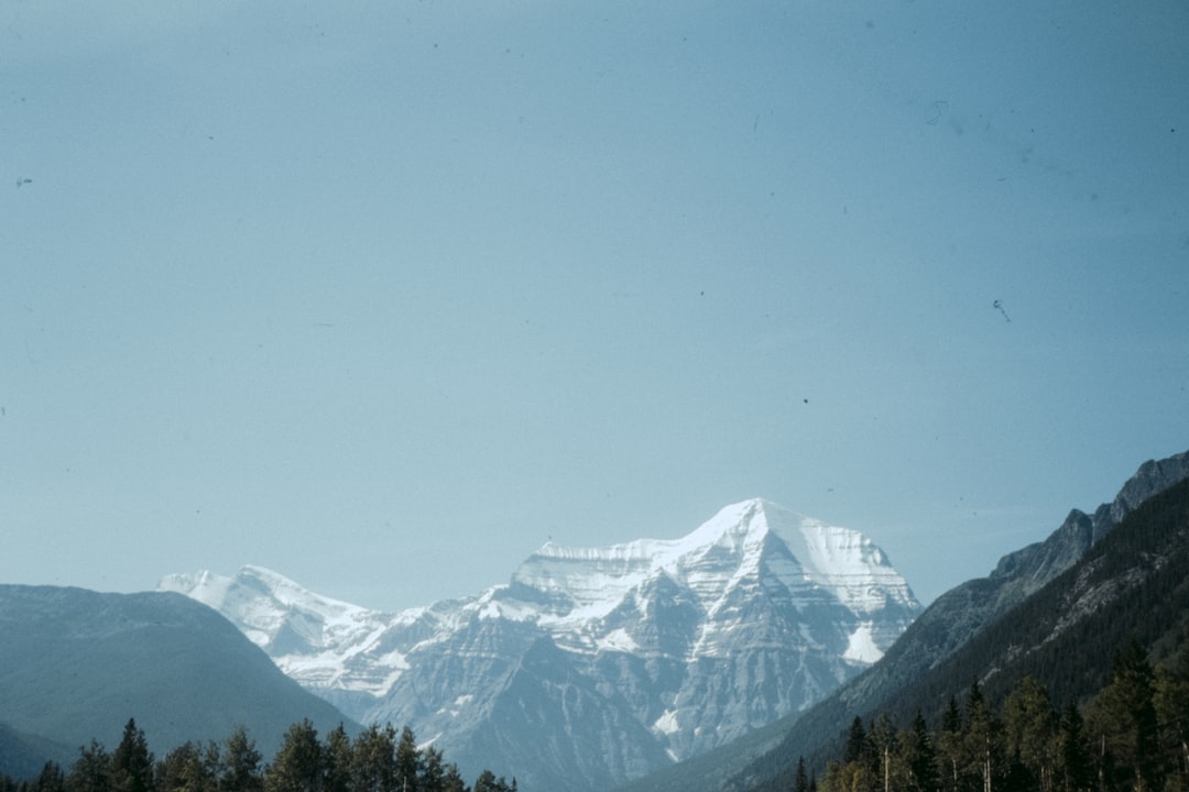 snow covered mountain under blue sky during daytime