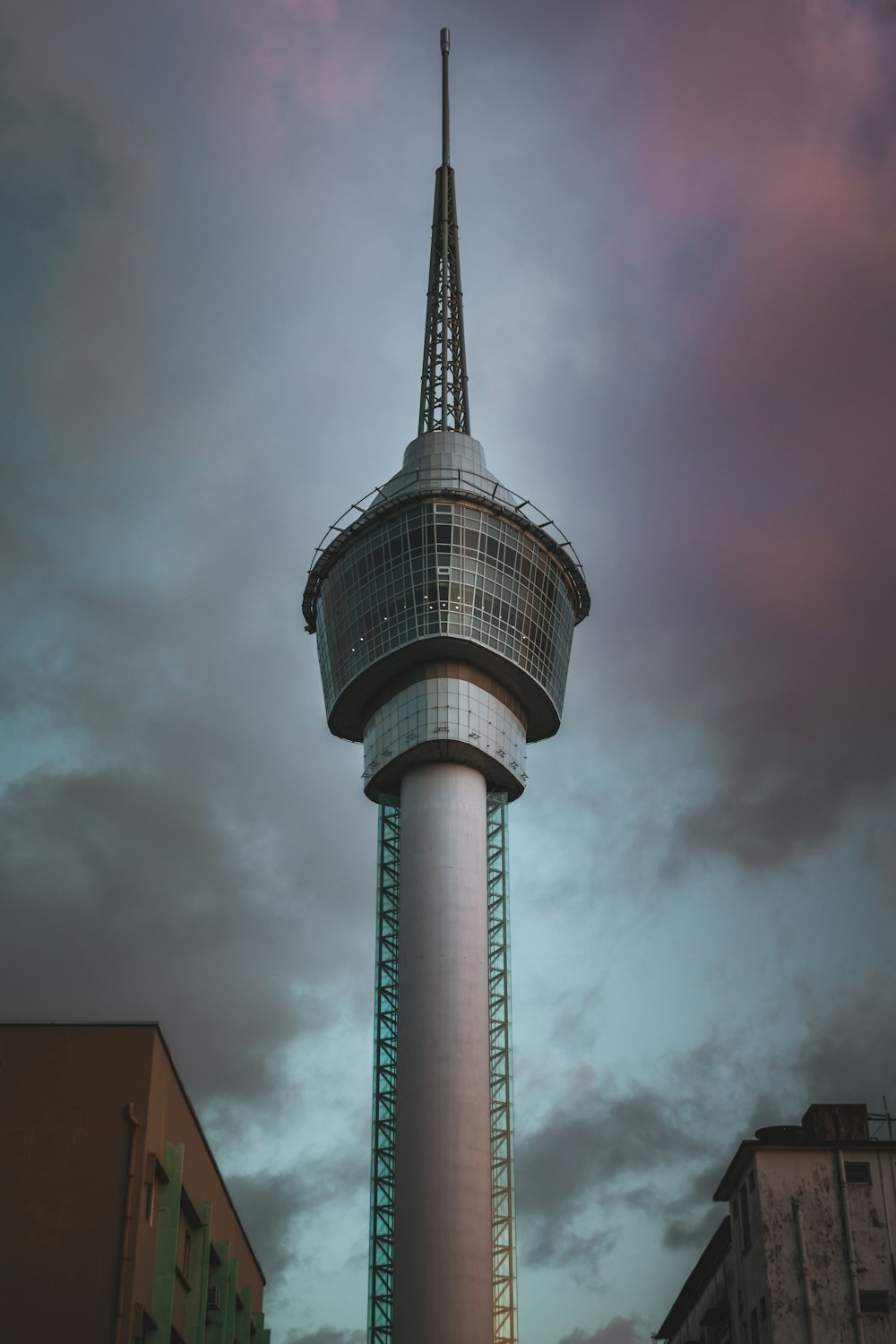 space needle tower under gray clouds