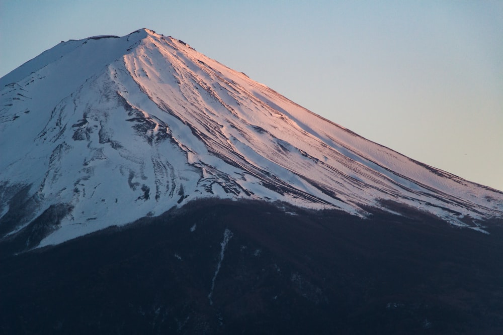 brown and white mountain under blue sky during daytime