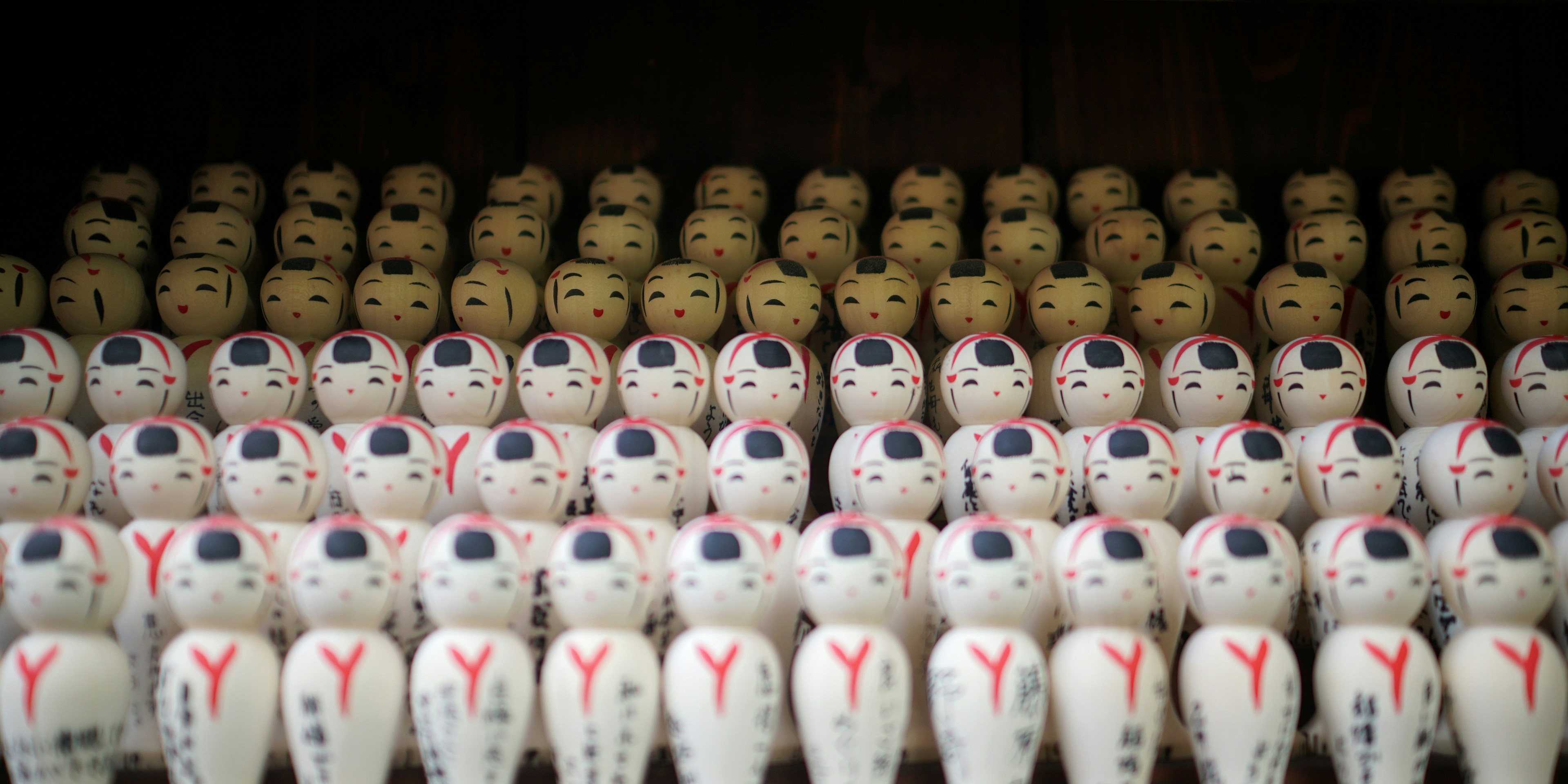 white and red ceramic mugs