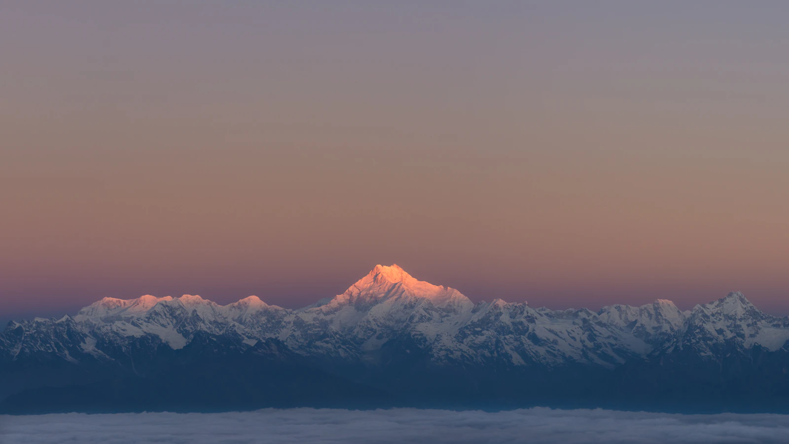 A snow peak of the Kanchenjunga range in clear morning light