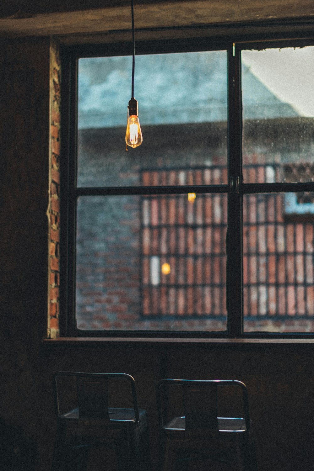 brown wooden framed glass window