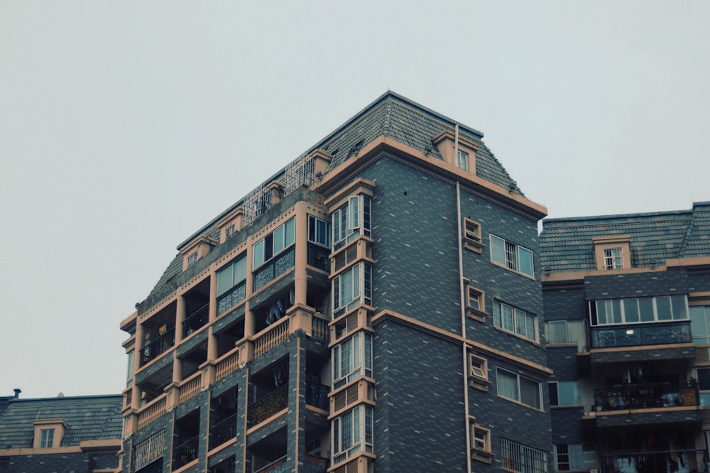 a tall building with a clock on the top of it