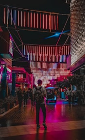 people walking on street during nighttime