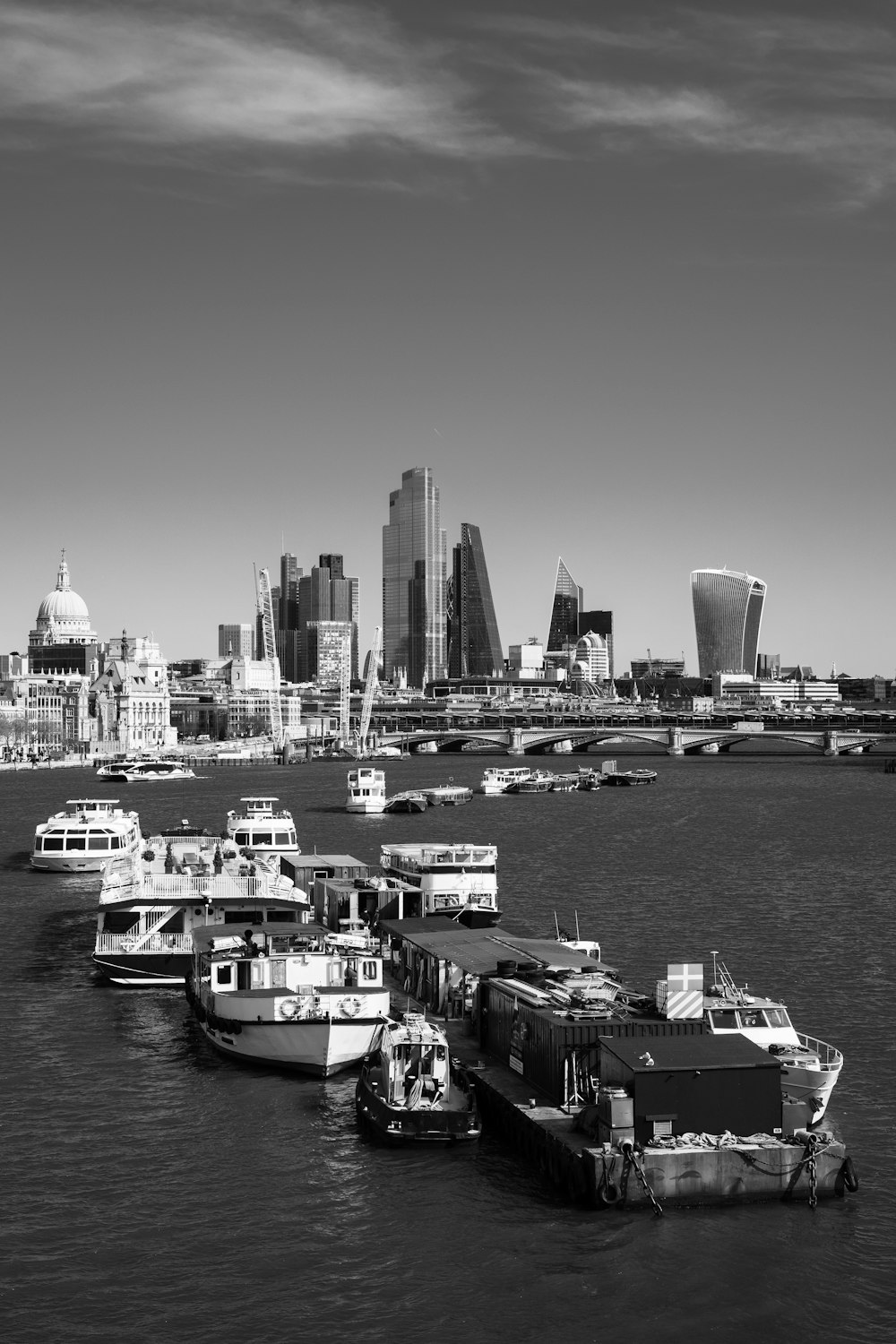 grayscale photo of city skyline during daytime