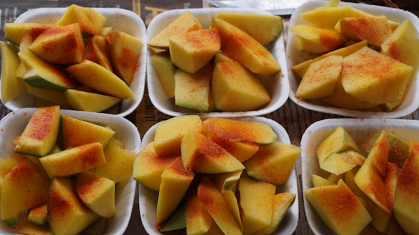 Sliced apple on white ceramic plate