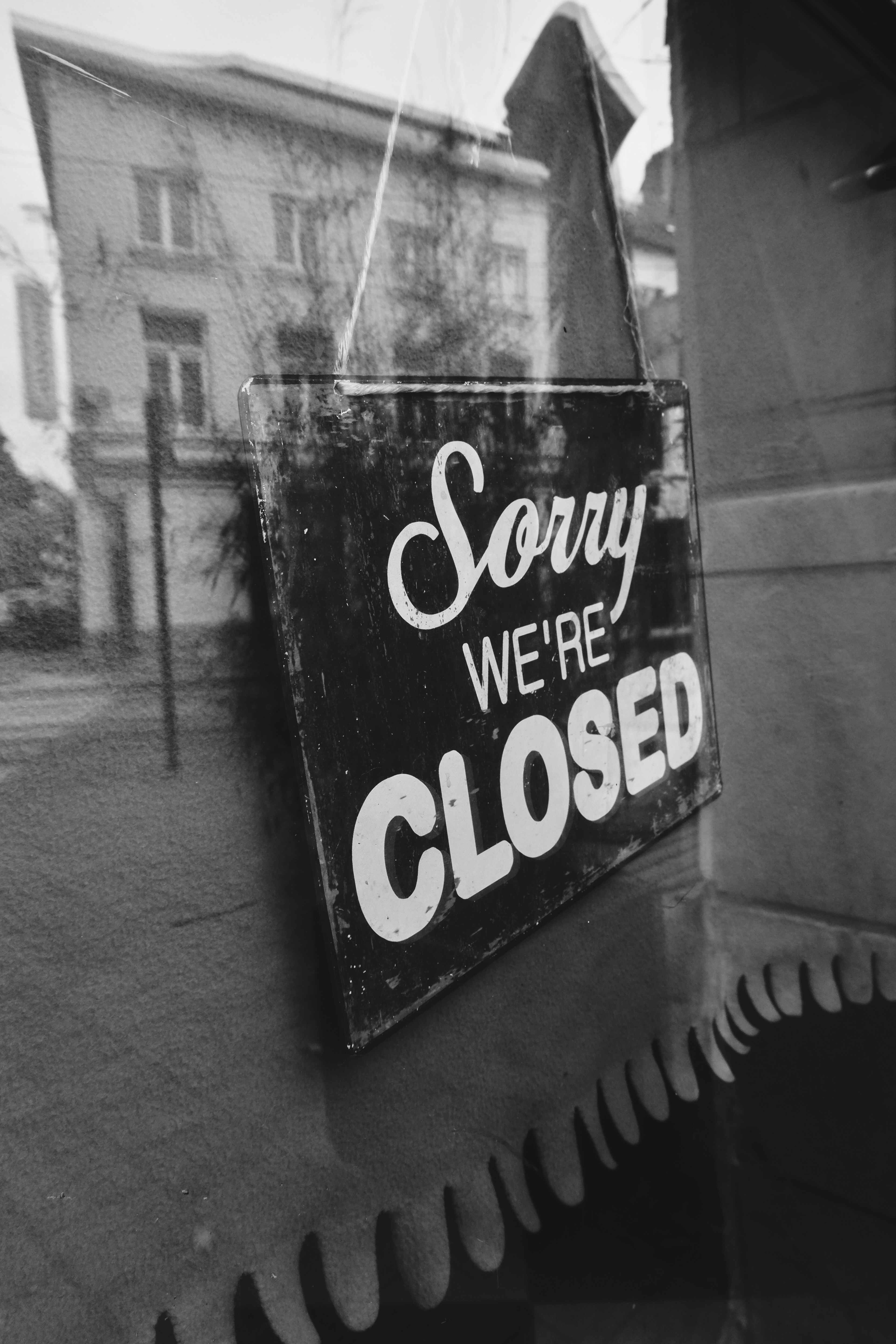 grayscale photo of coca cola signage